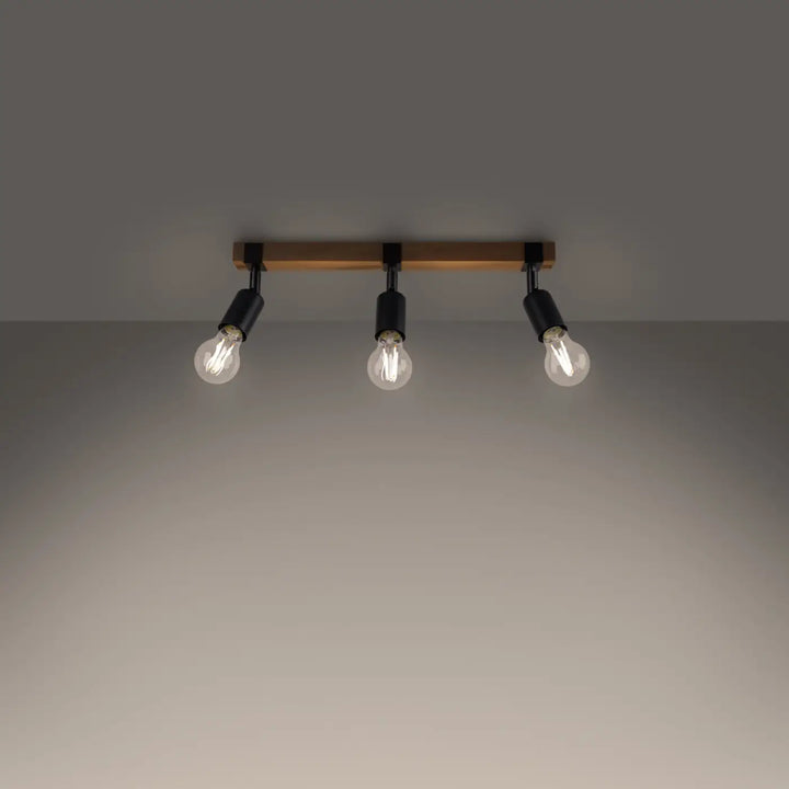 Luminaire plafonnier série zuca 3 noir avec ampoules décoratives visibles et petites œuvres dart sur barre en bois élégant