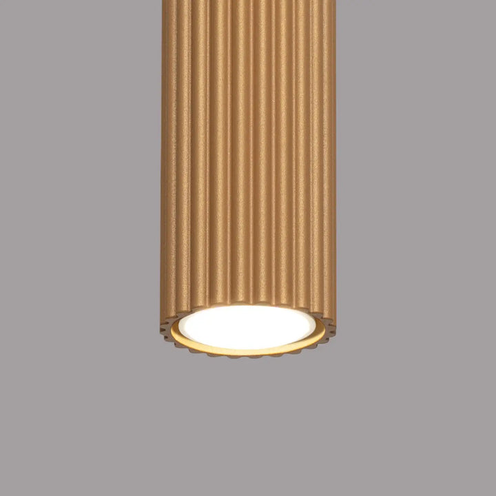 Plafonnier karbon design minimaliste en or avec texture cannelée verticale et ampoules gu10 interchangeables