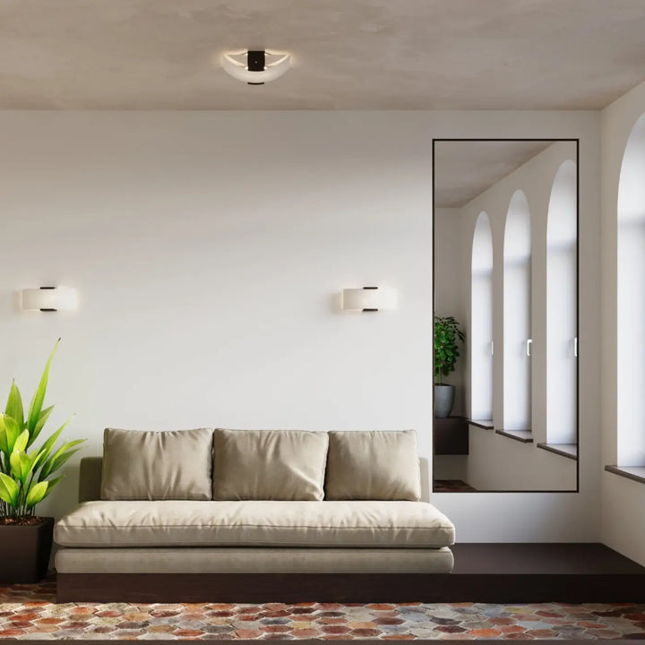 Luminaire plafonnier emilio avec sofa beige en tissu et base en bois foncé pour un design intemporel et fonctionnel