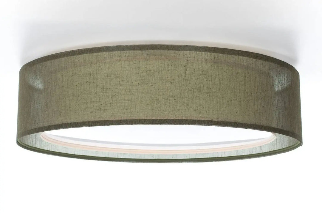 Luminaire plafonnier cylindrique vert olive en lin avec une lueur intérieure subtile design moderne pu ro