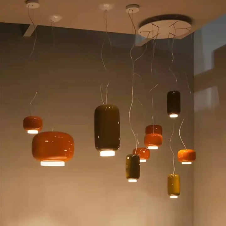 Collection de suspension luminaire moderne aural en céramique brillante orange chaud et brun foncé avec cordons métalliques fins