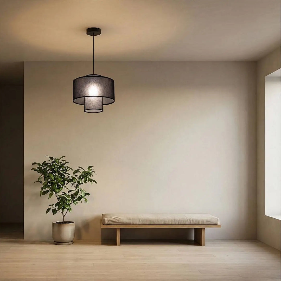 Suspension noire double cylindre avec abat-jour en mesh superposé suspendue au plafond