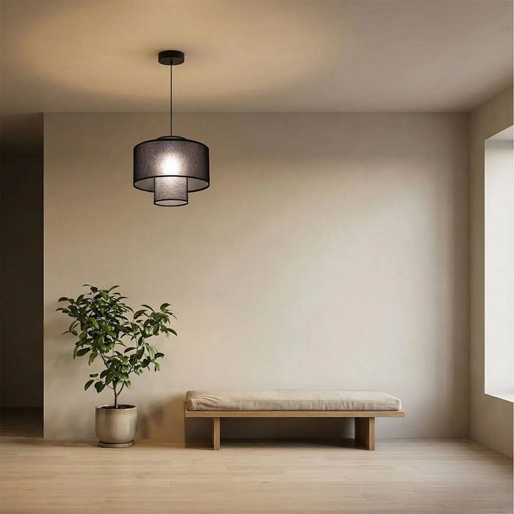 Suspension noire double cylindre avec abat-jour en mesh superposé suspendue au plafond