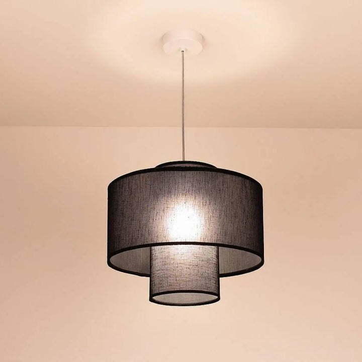 Suspension luminaire noire double avec abat-jours en tissu superposés cylindriques pour éclairage intérieur élégant