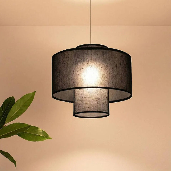 Suspension luminaire noire double avec abat-jour cylindrique en tissu superposé pour éclairage intérieur élégant