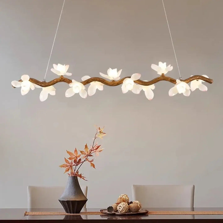 Suspension luminaire jemah en forme de branche courbée avec fleurs blanches, lampes suspendues parfaites pour mètres carrés raffinés