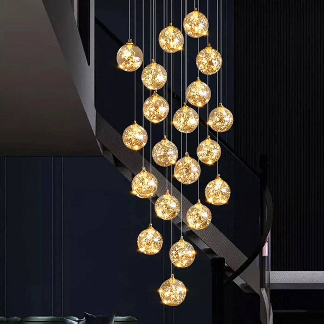 Plafonnier cascade moderne à LED dorées suspendues

