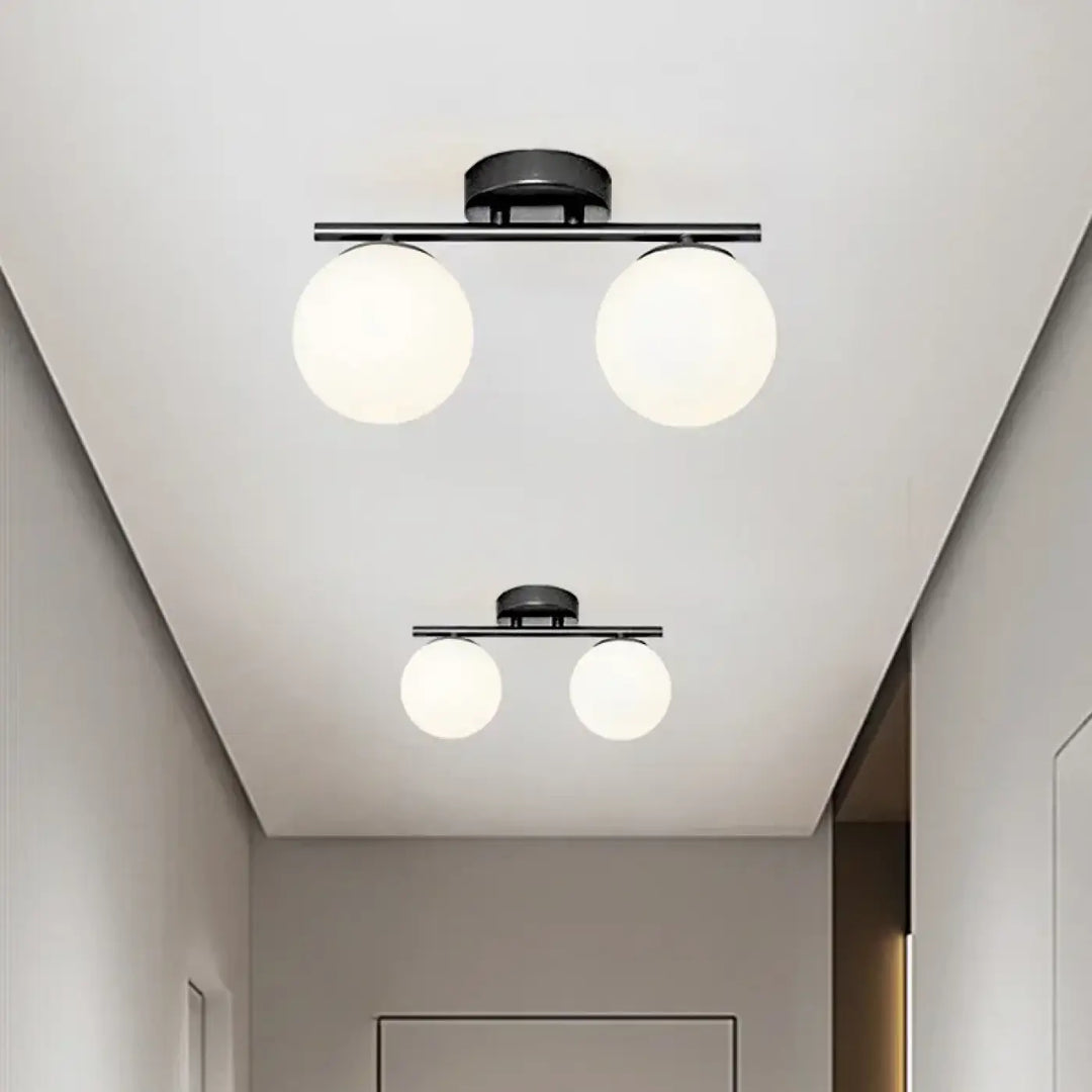 Plafonnier à deux globes lumineux style design élégant