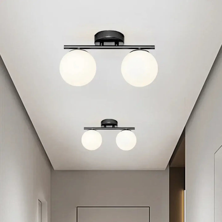 Plafonnier à deux globes lumineux style design élégant