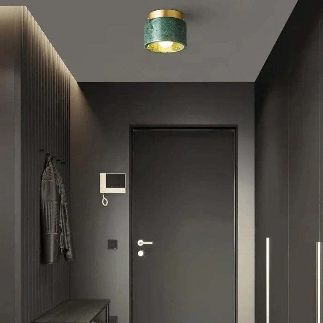 Plafonnier cylindre marbre élégant ambiance luxe blanc