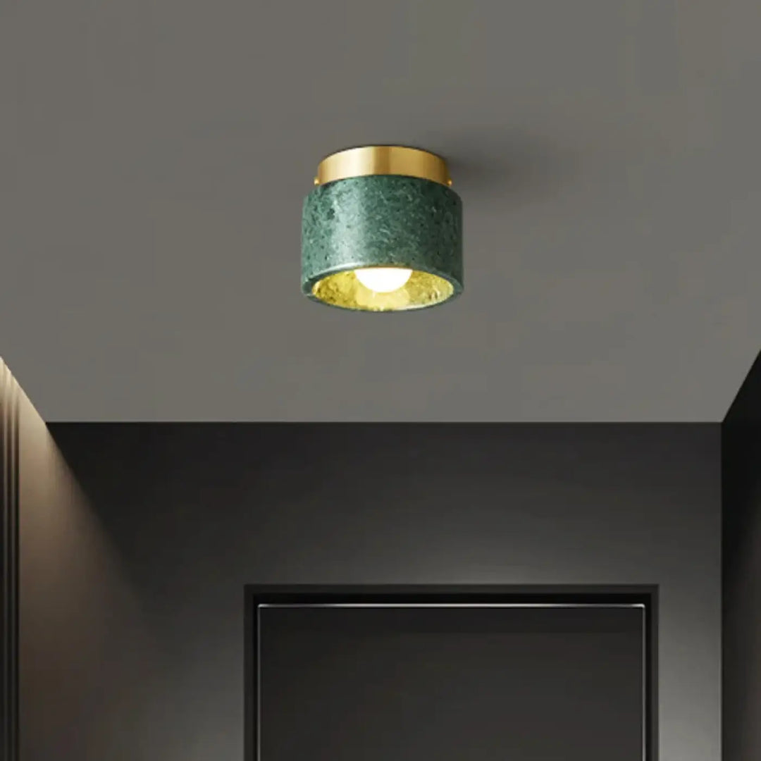 Plafonnier cylindre marbre élégant ambiance luxe blanc