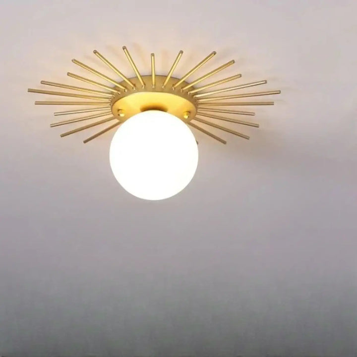 Luminaire plafonnier spika design étoilé en métal doré avec globe en verre dépoli pour éclairage intérieur élégant