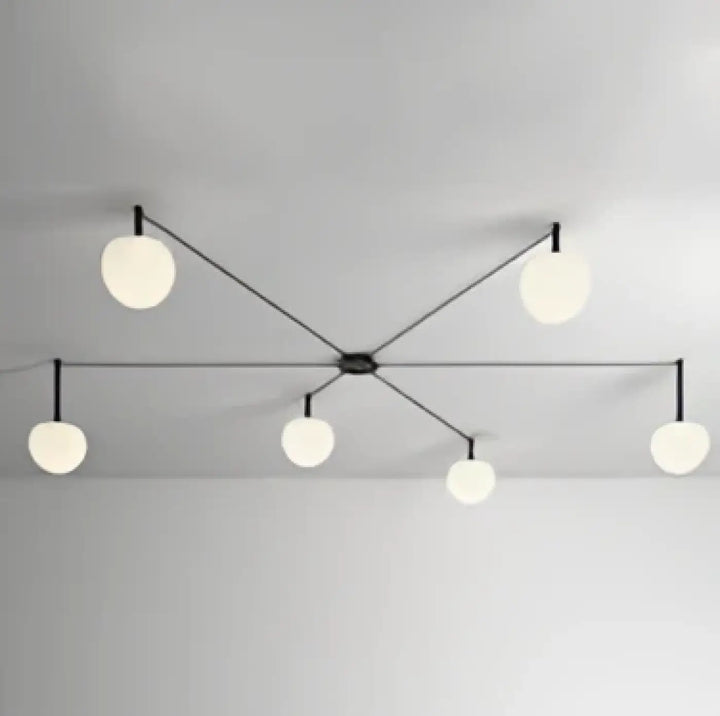 Suspension luminaire aiko en métal noir moderne avec globes en verre blanc pour plafonnier design et décoration intérieure univers déco