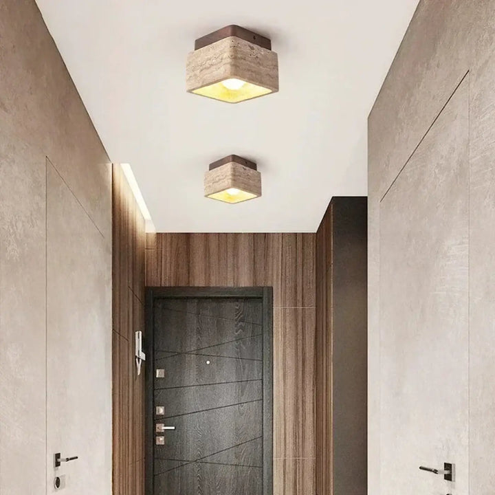 Luminaire plafonnier rtinah avec finition pierre texturée et lumière jaune chaud pour décoration intérieure bois naturel plafonnier design