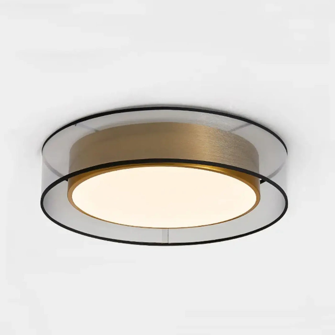Luminaire plafonnier vadim moderne avec anneau central en or brossé, anneaux extérieurs en acrylique clair et bord noir