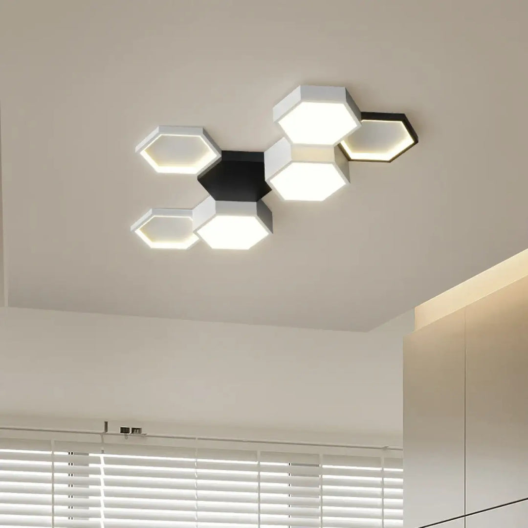 Plafonnier LED moderne à hexagones blancs et noirs imbriqués

