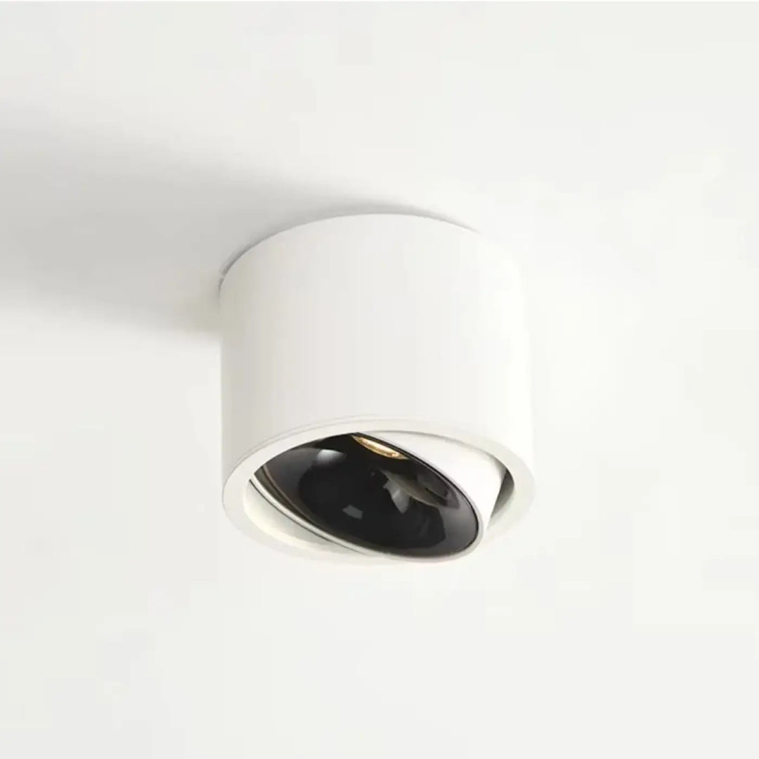 Luminaire plafonnier kryo cylindrique blanc avec réflecteur intérieur noir et flux lumineux réglable d’un variateur