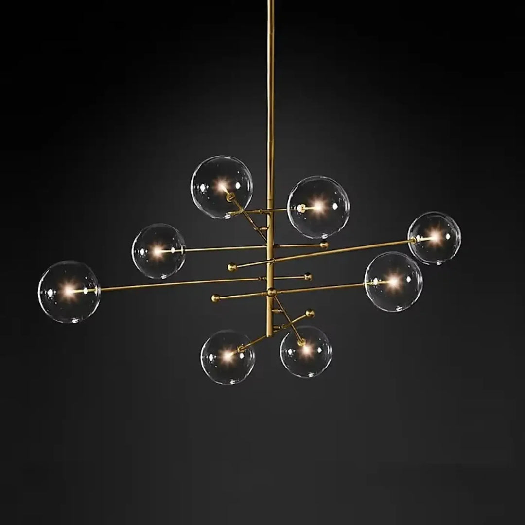 Plafonnier moderne laiton doré atomix avec ampoules sphériques en verre clair pour salle à manger élégante
