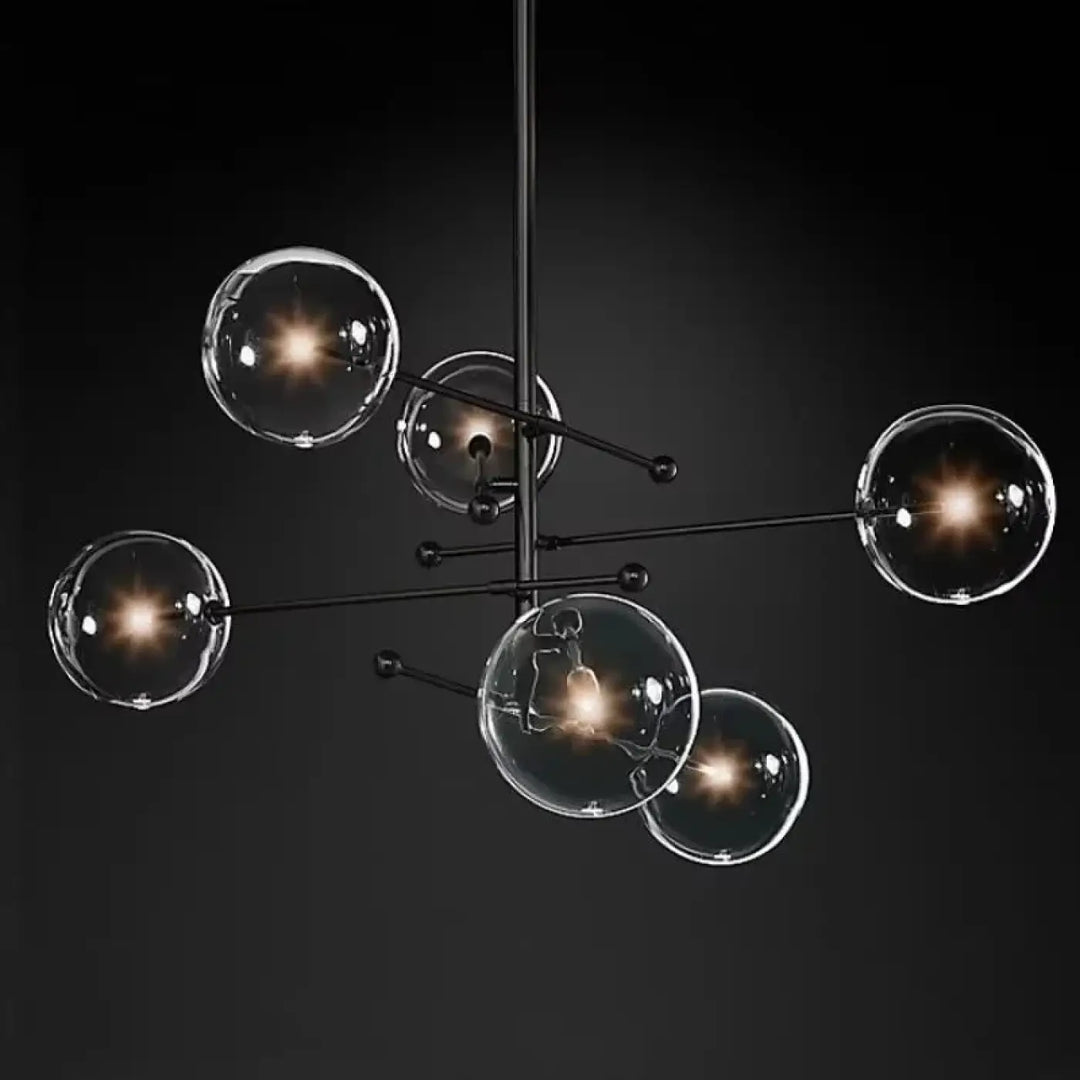 Plafonnier moderne atomix noir avec globes en verre clair idéal pour salle à manger acier et laiton doré
