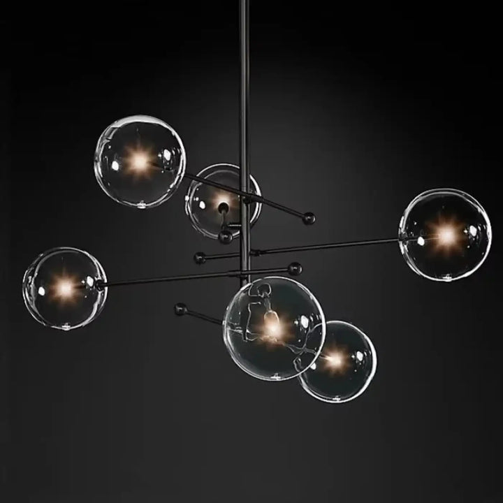 Plafonnier moderne atomix noir avec globes en verre clair idéal pour salle à manger acier et laiton doré