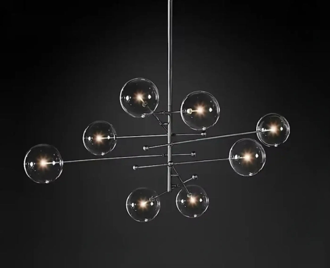 Plafonnier moderne atomix en métal noir avec globes en verre clair idéal pour salle à manger laiton doré accents