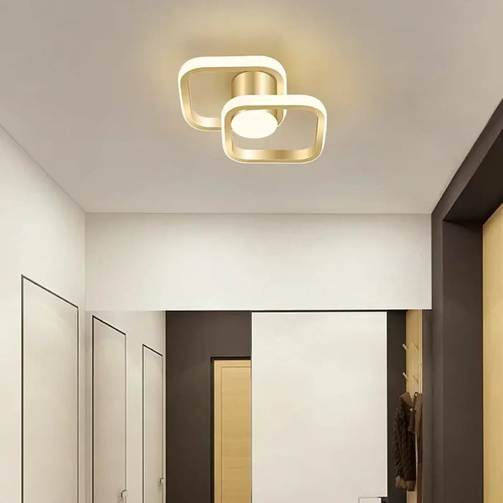 Plafonnier moderne minimaliste doré au design épuré et élégant