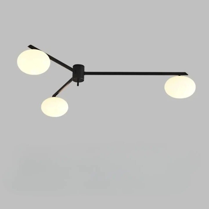 Plafonnier moderne noir en métal avec trois globes en verre blanc satiné et bras graphiques luminaire plafonnier xilys