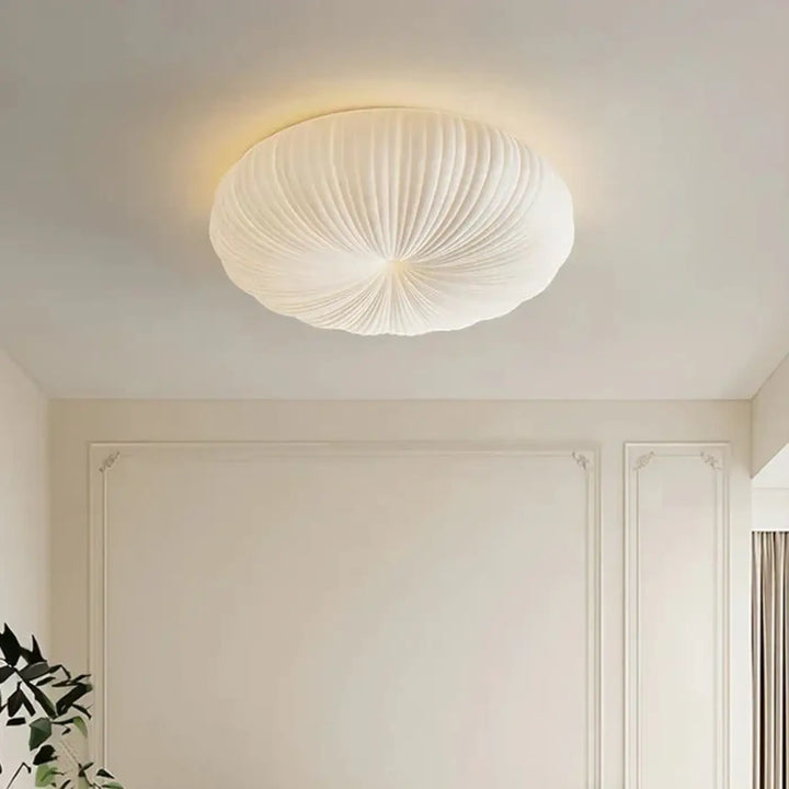 Plafonnier moderne en verre blanc à effet lumineux et au style épuré