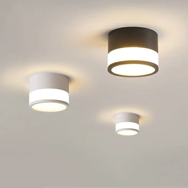 Luminaire plafonnier eblouia avec plafonnier nordique cylindrique design minimaliste finition mate et lumière diffuse chaude