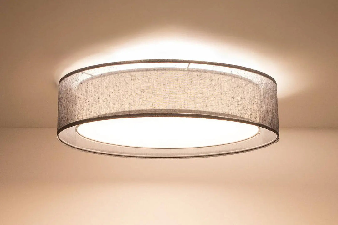 Plafonnier rond graphite avec abat-jour en tissu gris texturé et cadre métallique élégant luminaire plafonnier puro graphite