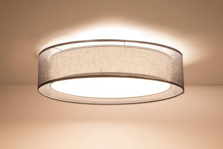 Plafonnier rond graphite avec abat-jour en tissu gris texturé et cadre métallique élégant luminaire plafonnier puro graphite