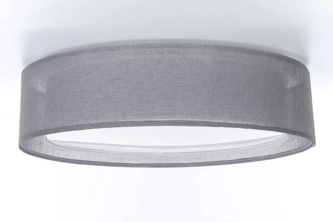 Plafonnier rond graphite en toile grise avec texture subtile pour un éclairage intérieur élégant puro