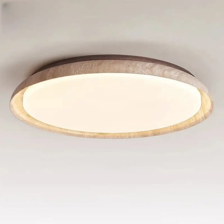 Luminaire plafonnier koru avec source lumineuse circulaire diffuse et cadre en pierre beige et brun en matériau principal