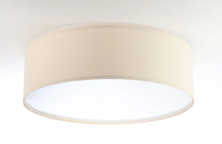 Plafonnier rond beige en tissu champagne avec doublure intérieure blanche pour une atmosphère chaleureuse