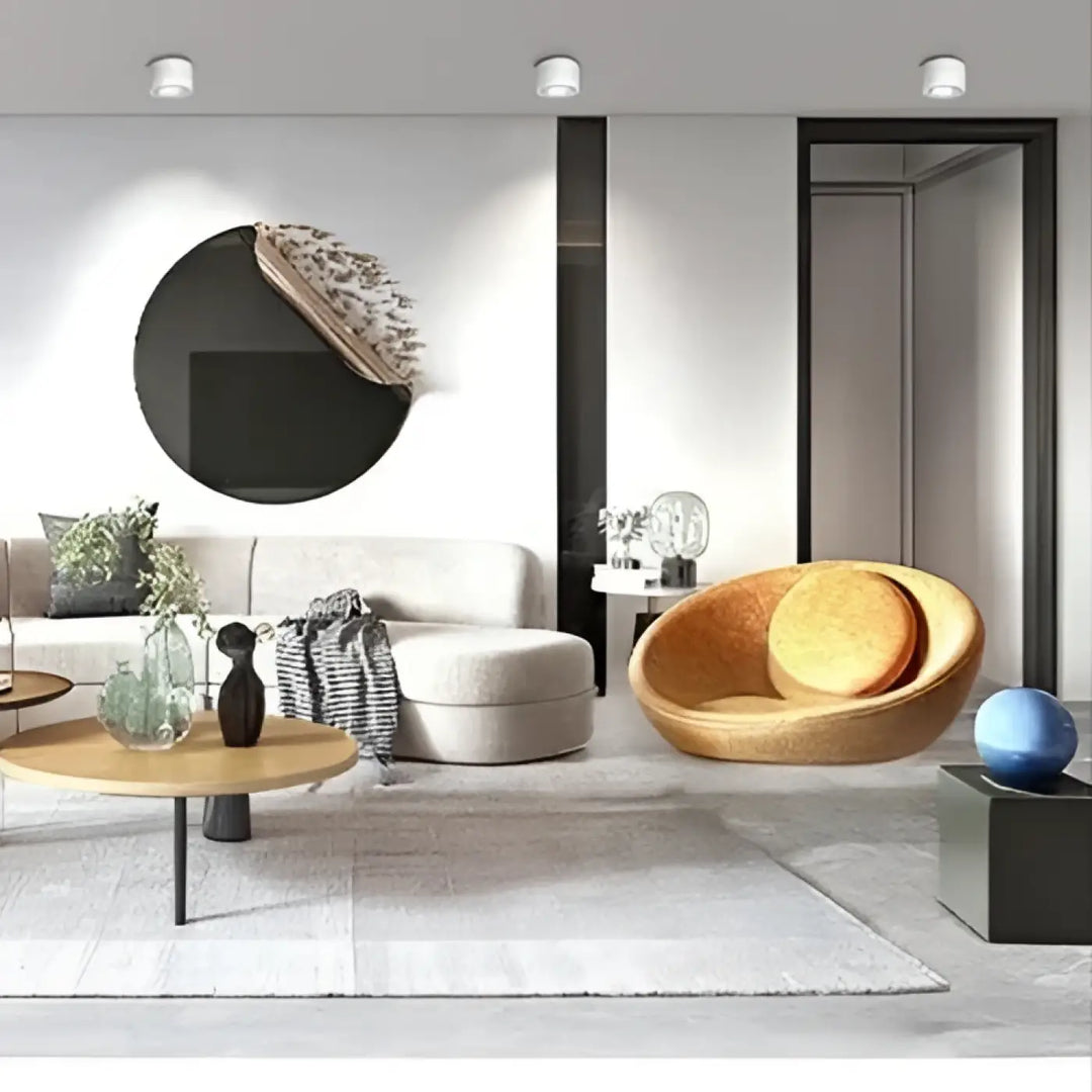 Luminaire plafonnier trigo avec saillie orientable et éclairage led ajustable dans un fauteuil tressé doré moderne
