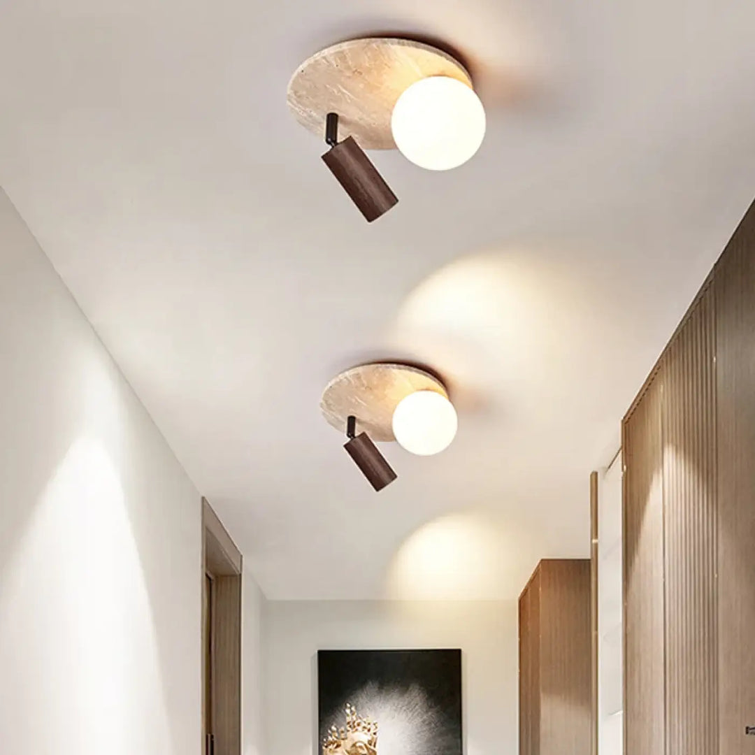 Luminaire plafonnier medier avec spots orientables sur base circulaire en pierre texturée et bras ajustables en bois foncé opalin design minimaliste