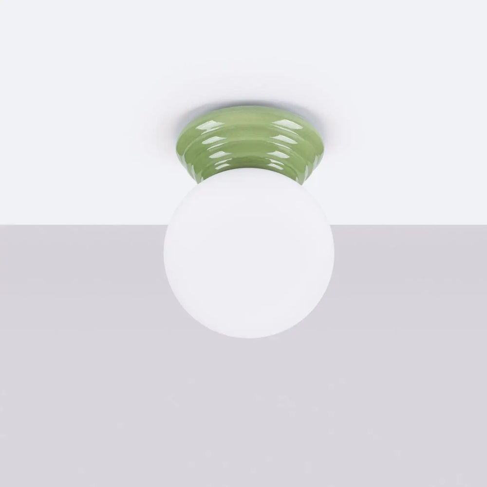 Plafonnier zori vert en céramique mate avec globe en verre blanc lisse lampe zori belle décoration qualités esthétiques