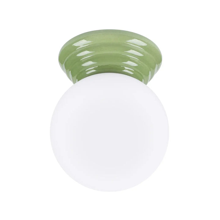 Plafonnier zori vert en céramique mate avec globe en verre arrondi, lampe zori alliant belle décoration et qualités esthétiques