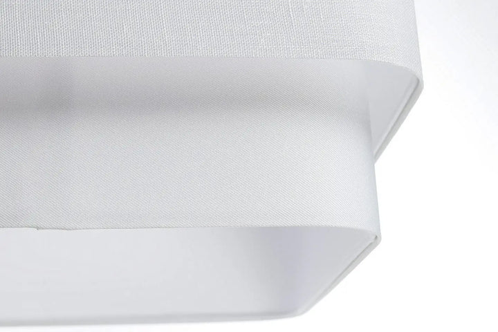 Suspension blanche design kwadro duo avec abat-jour en tissu blanc à texture tissée subtile et contours angulaires modernes