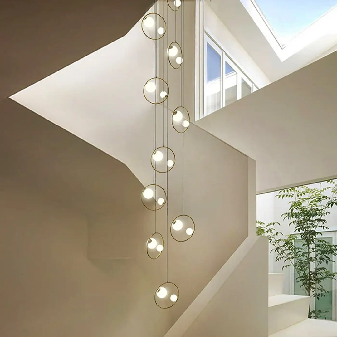 Suspension Cascade LED Moderne Avec Sphères Ajourées Chic Doré