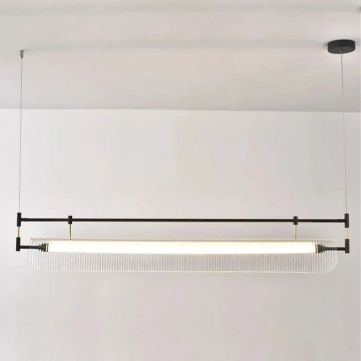 Suspension luminaire flotys en métal noir moderne avec diffuseur en verre dépoli et tube lumineux à ridges verticales style aérien