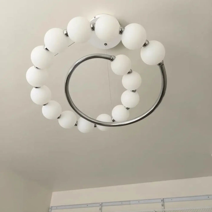 Suspension design anneau lumineux à globes blancs