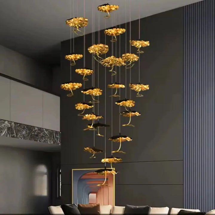 Suspension artistique feuilles sculptées noir doré élégant