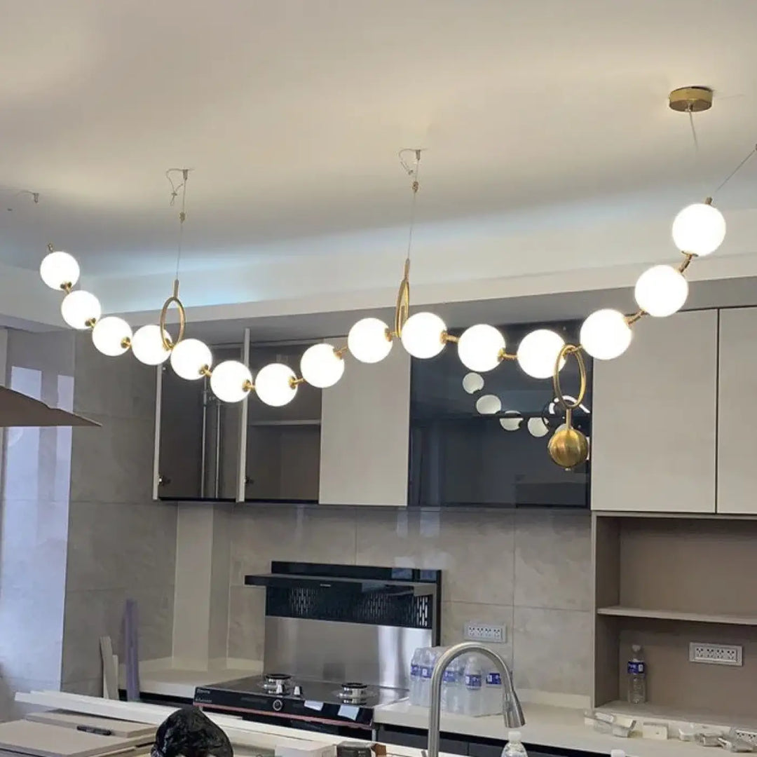 Suspension moderne boules lumineuses doré blanc raffiné