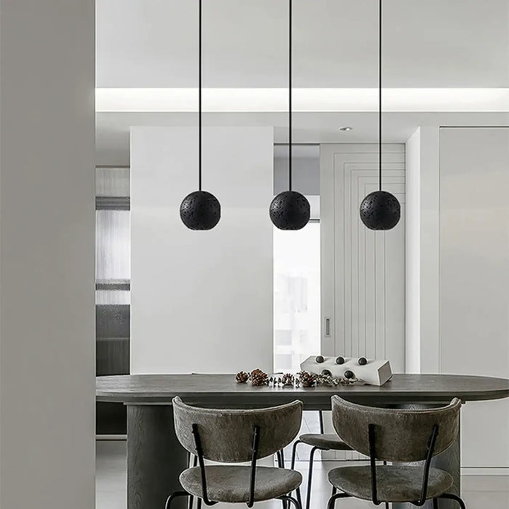 Suspension design sphère moderne éclairage noir chic