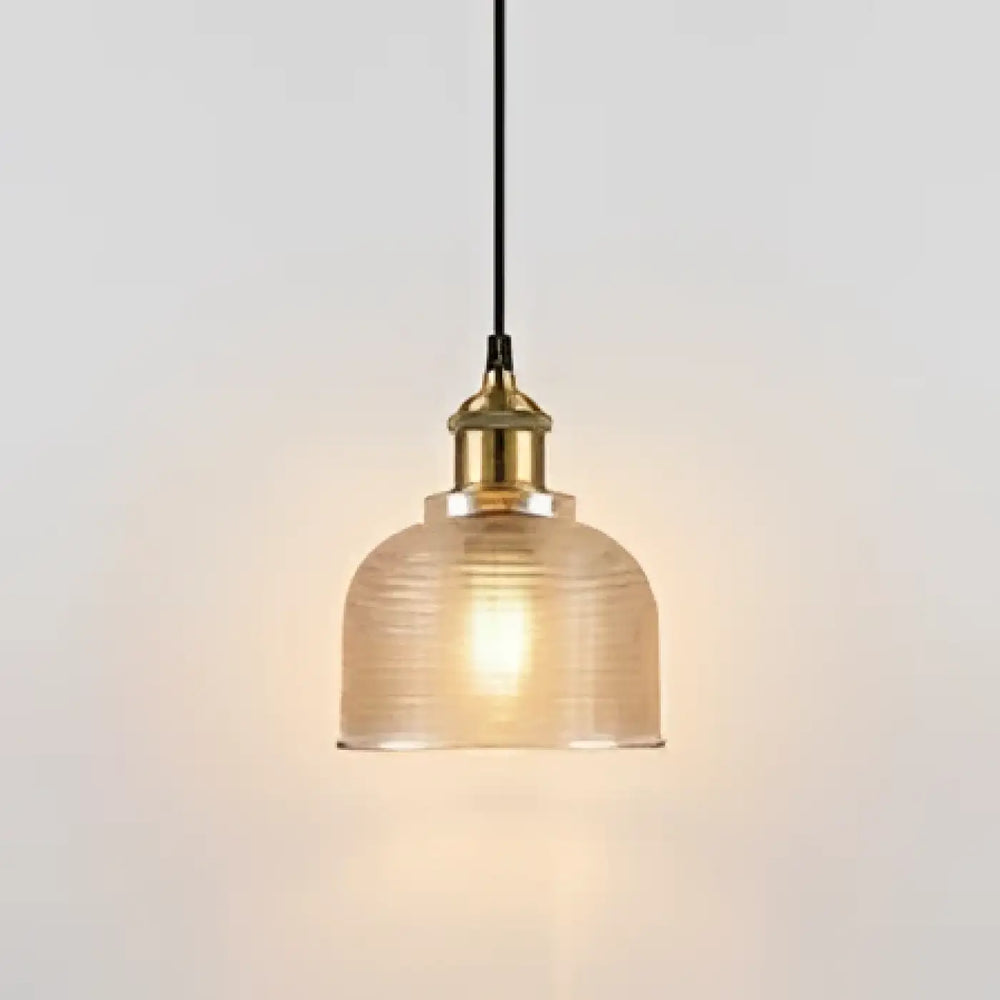 Suspension luminaire italino avec verre strié translucide et finition en métal laiton pour suspension industrielle chaleureuse