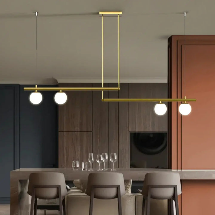 Suspension linéaire dorée avec globes en verre style moderne