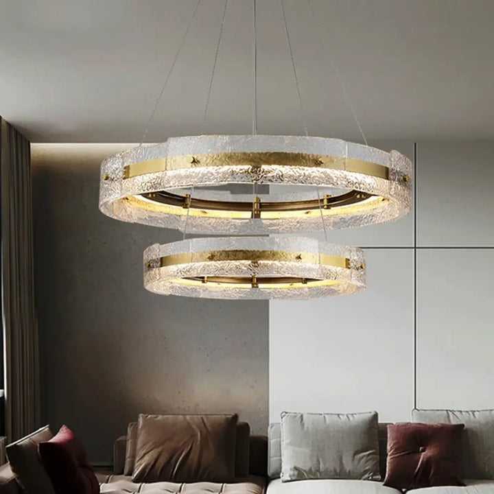 Suspension luminaire diamara avec anneaux flottants en verre texturé clair et accents métalliques dorés pour décoration intérieure