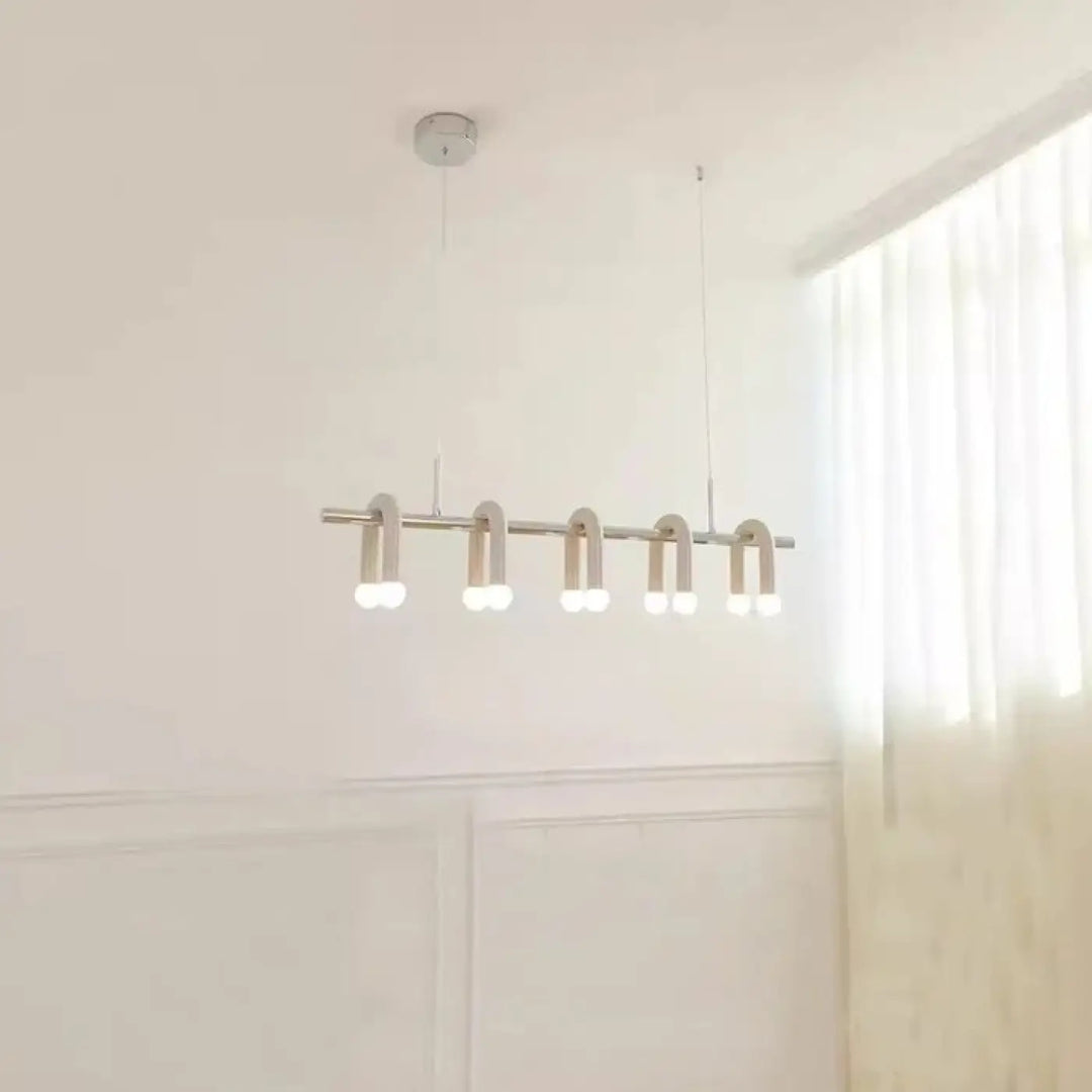 Suspension luminaire moderne minimaliste avec cinq bras métalliques courbés et ampoules led blanc chaud