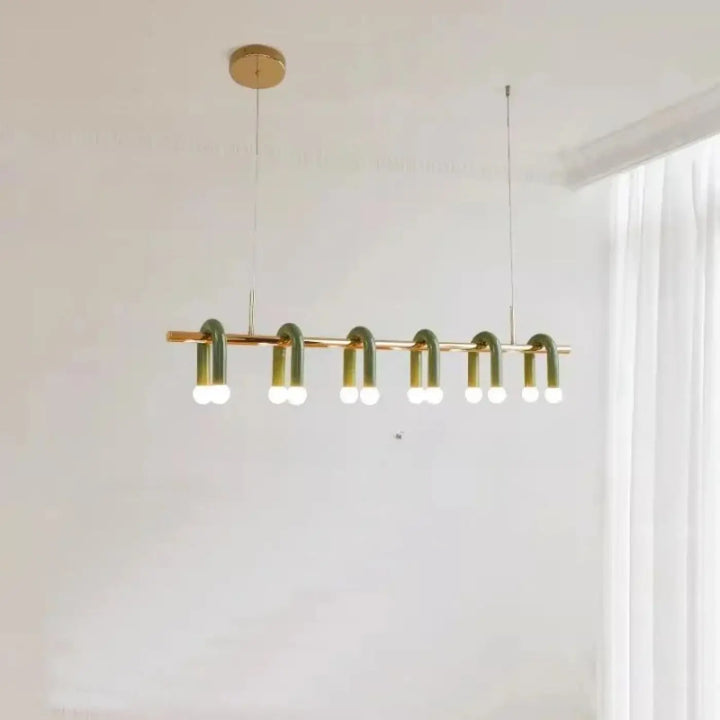 Suspension luminaire modern en métal doré et vert avec luminaires cylindriques courbés et ampoules blanc chaud